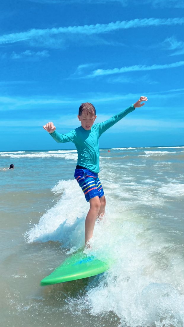 Kid surfing